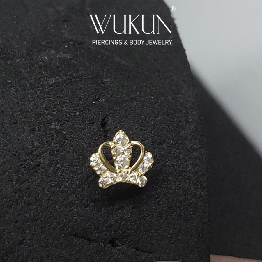 18k gold piercing ring with crown shape and stones