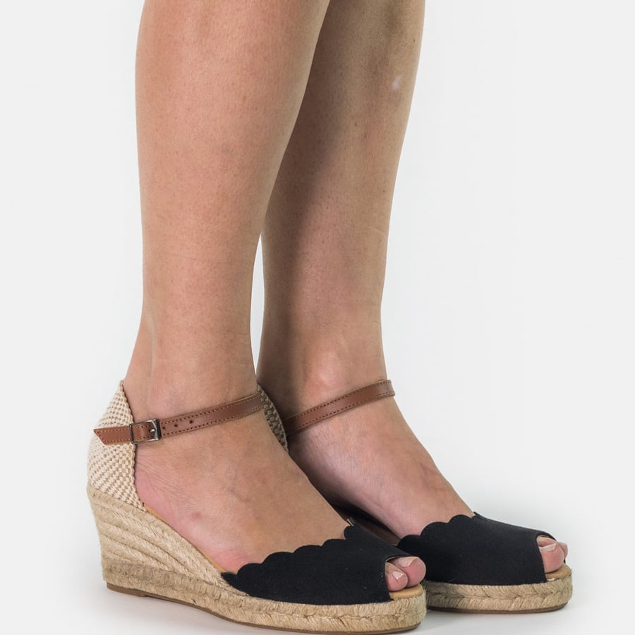 Stylish black high heeled sandal with straps