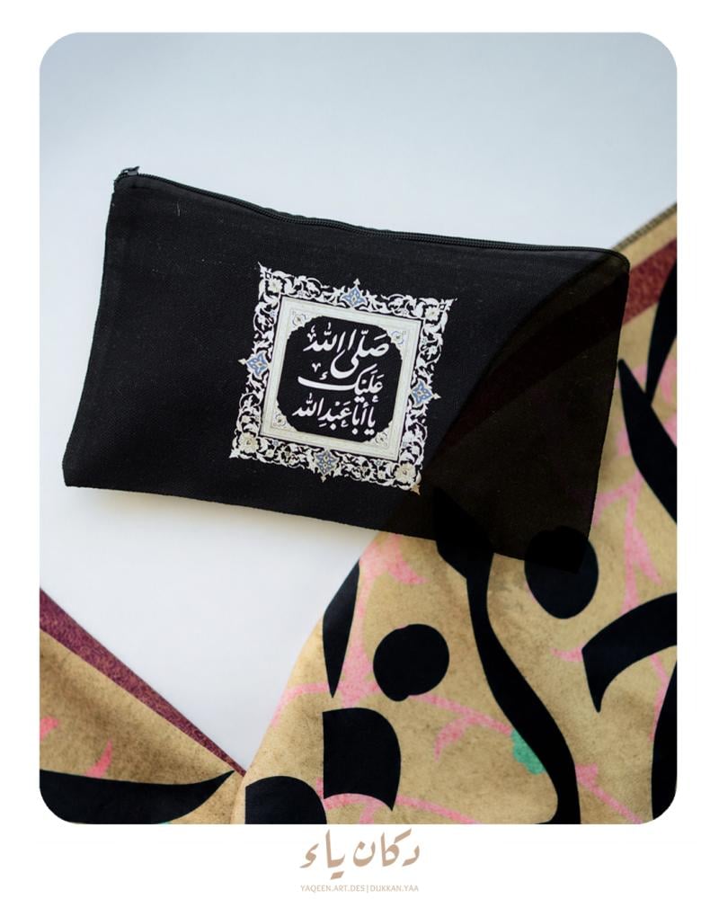 محفظة قماشية باللون الأسود
