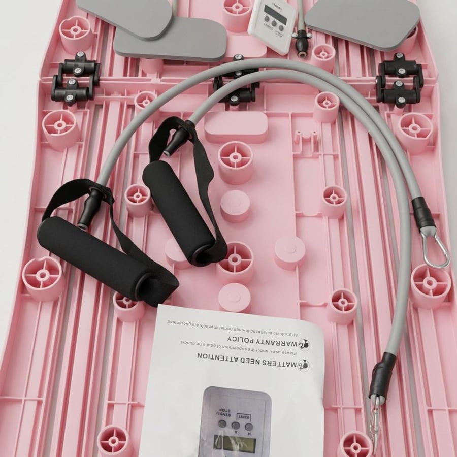 Foldable Pilates board with resistance bands for full-body exercises with digital screen