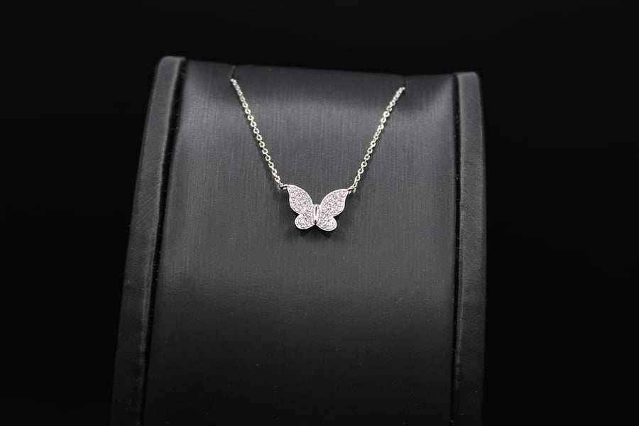 S17 a silver bracelet of 925 standard in the shape of a butterfly