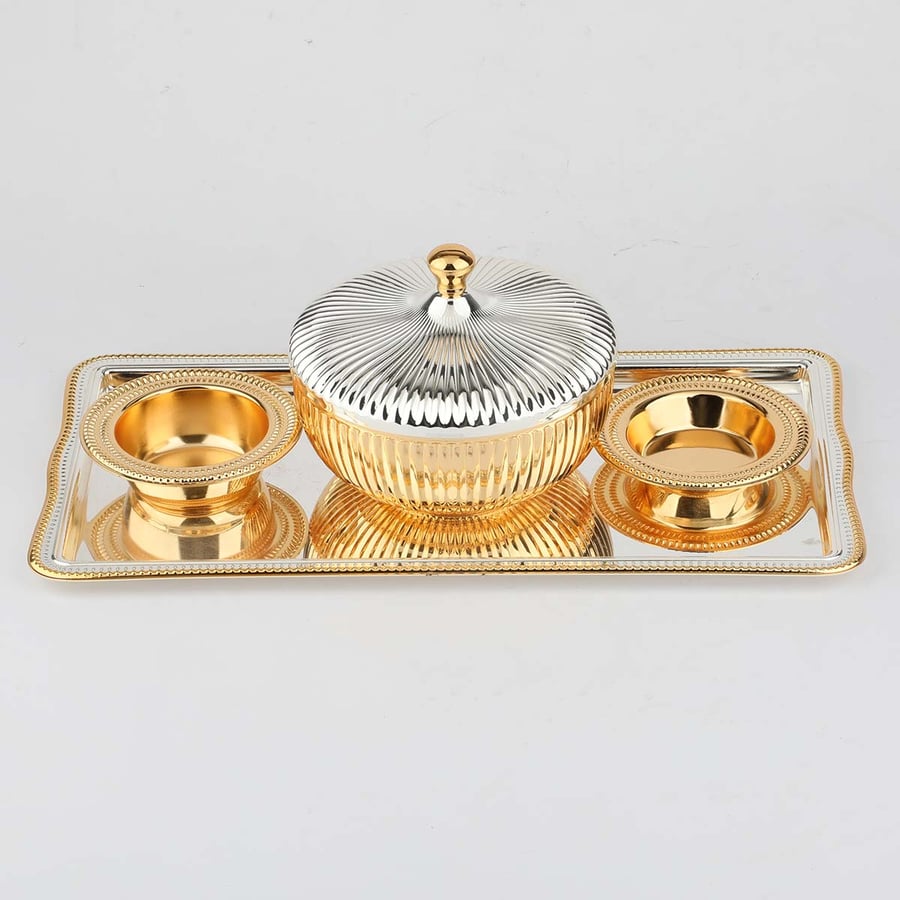 A Boussi set with a silver date palm and shiny gold steel