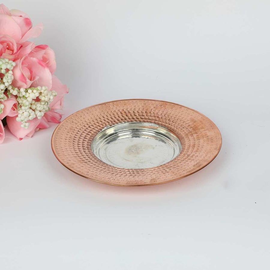 Bowl with a copper plate