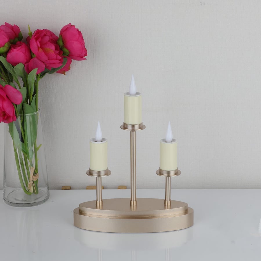 Lit candles, 3 pieces