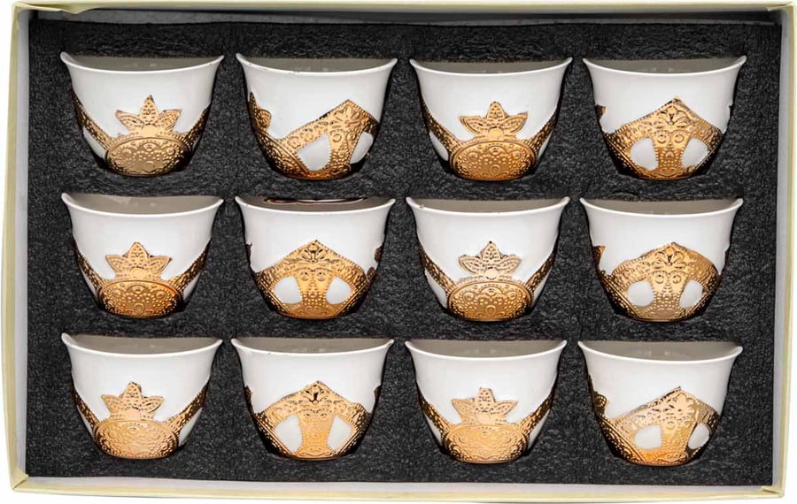 A set of white decorated coffee cups with a gold base, 12 pieces