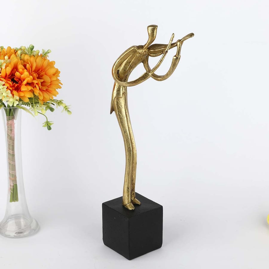 Ceramic guitarist sculpture, height 42 cm