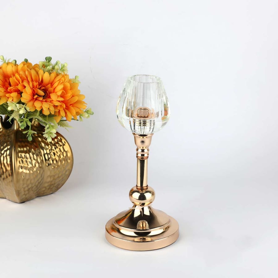 Golden candle holder with glass, height 25 cm