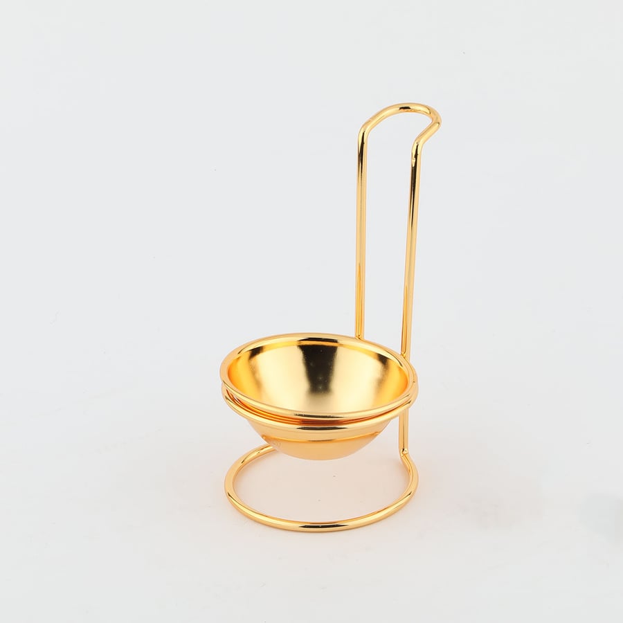 Spoon stand with a golden base