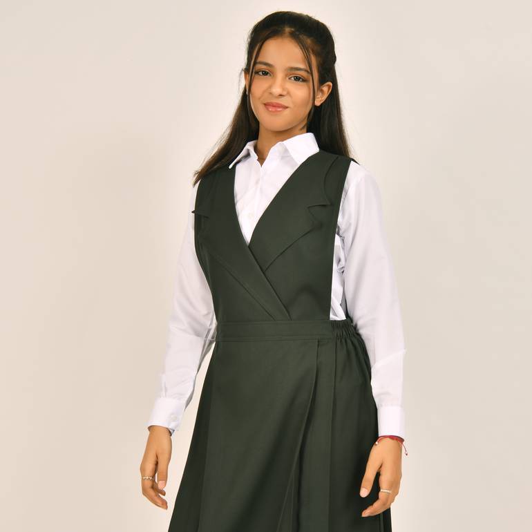 Olive green apron with a blazer collar and pleats on the sides