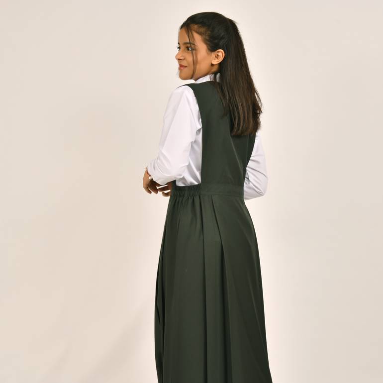 Olive green apron with a blazer collar and pleats on the sides