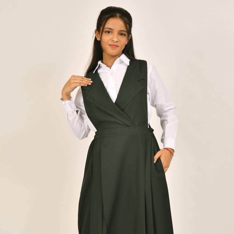 Olive green apron with a blazer collar and pleats on the sides