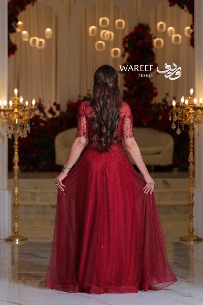 Dusty rose dress decorated with luxurious embroidery
