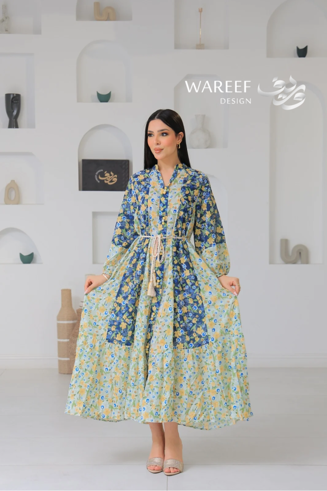 Soft thobe with a gradient floral pattern and calm colors with a braided waist belt