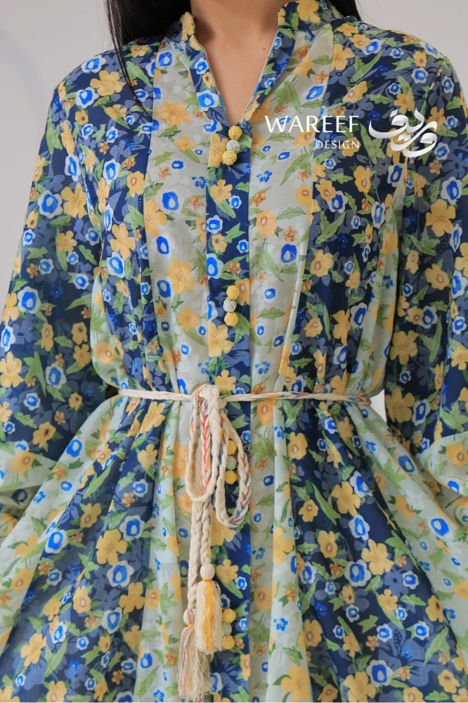 Soft thobe with a gradient floral pattern and calm colors with a braided waist belt