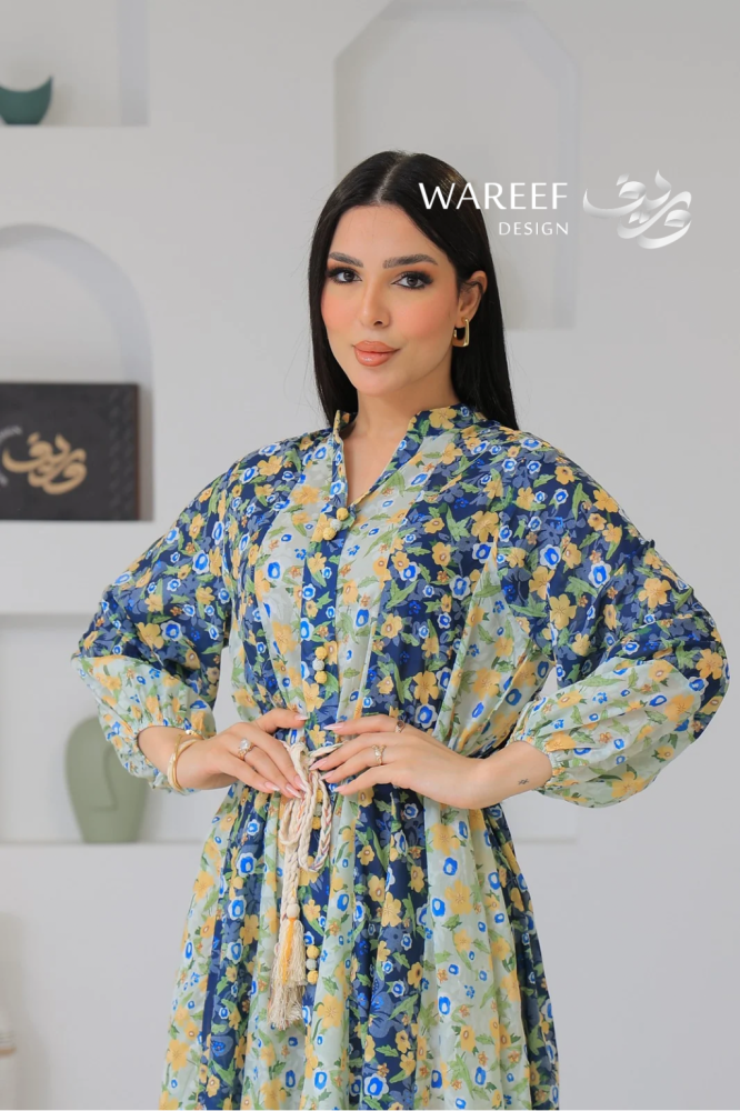 Soft thobe with a gradient floral pattern and calm colors with a braided waist belt