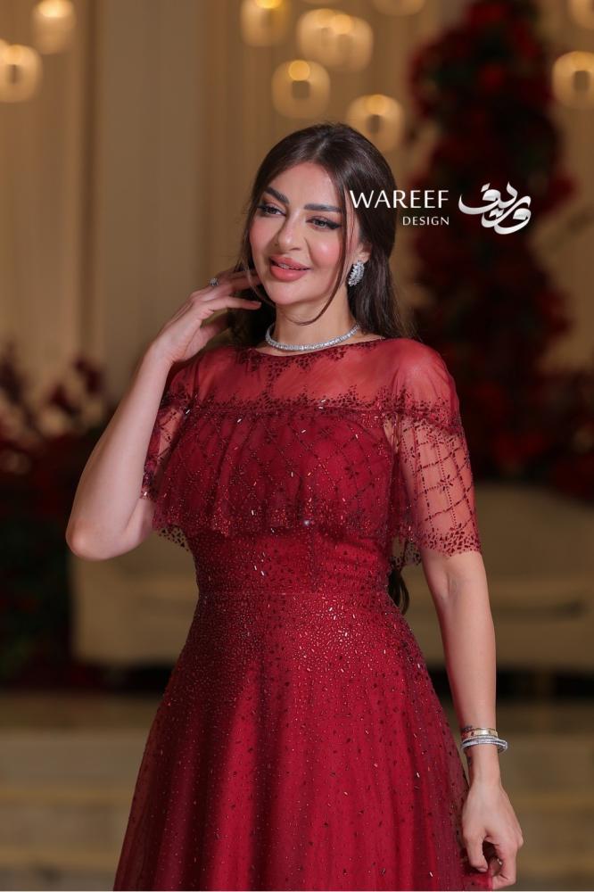Dusty rose dress decorated with luxurious embroidery