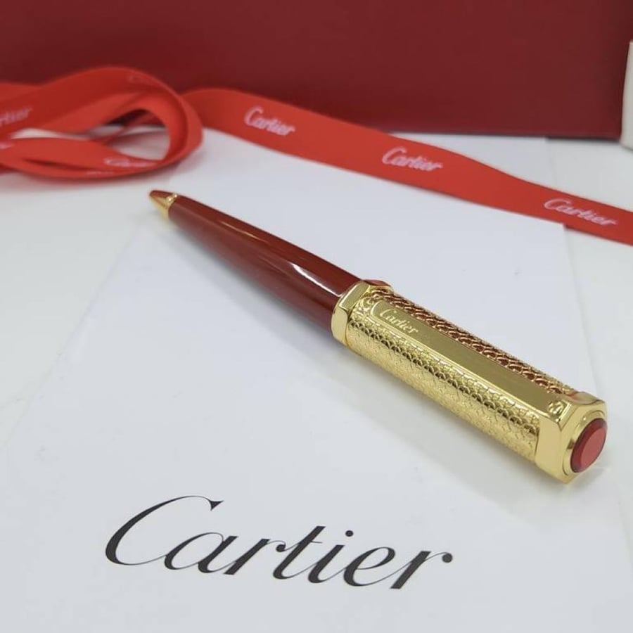 Cartier pen brown in gold