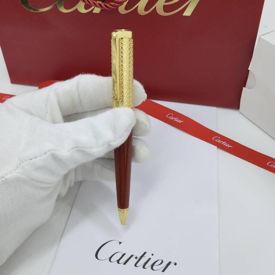 Cartier pen brown in gold