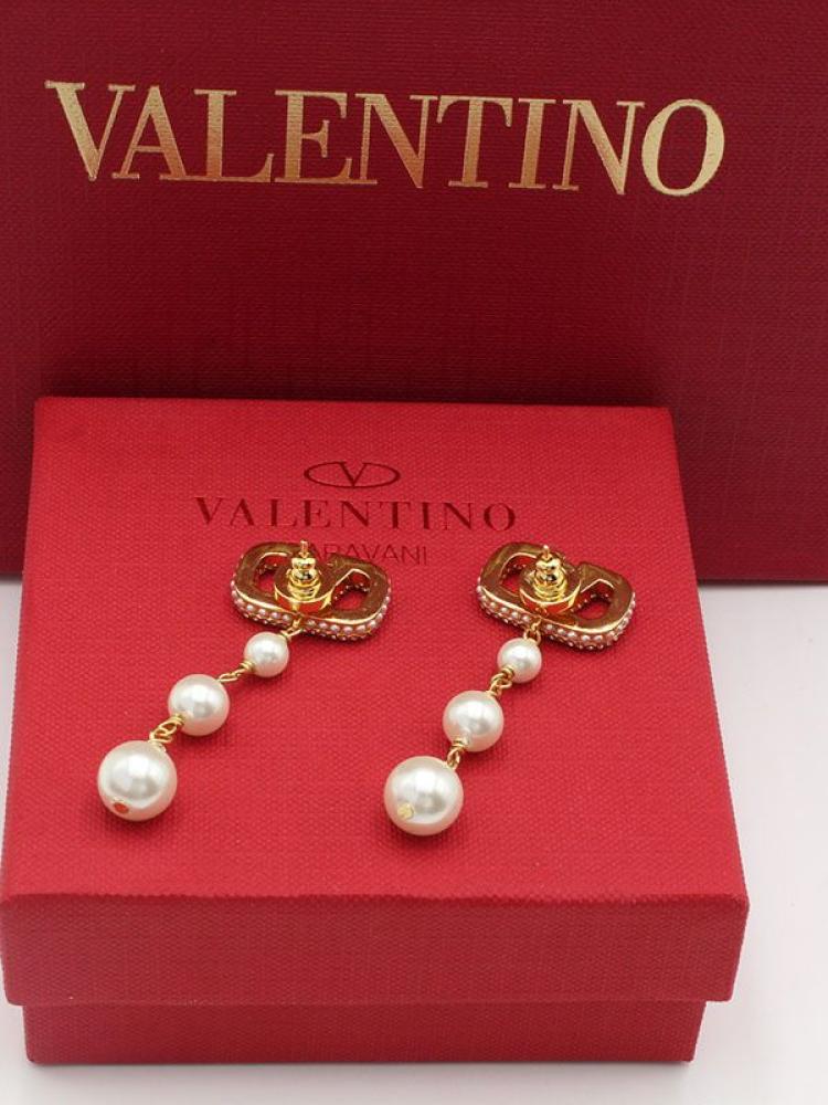 Valentino elegant earrings with V logo design encrusted with sparkling crystal