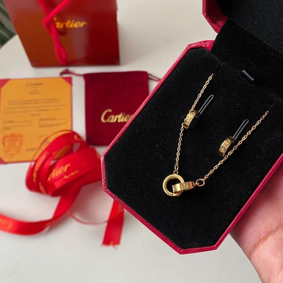 Necklace and earrings with accessories Cartier