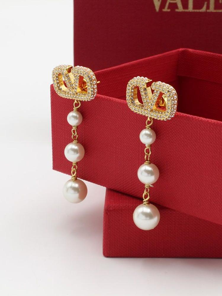 Valentino elegant earrings with V logo design encrusted with sparkling crystal