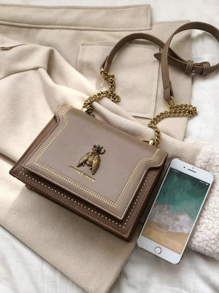 Small women's crossbody bag with bee design, gold chain, luxurious leather, brown