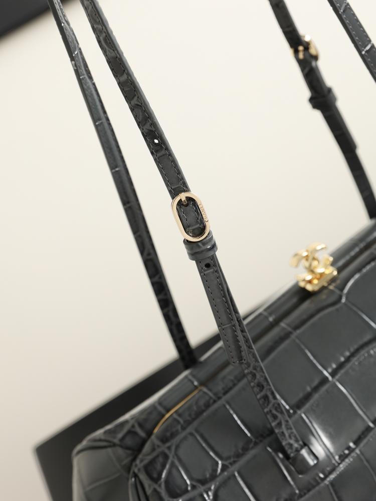 CHANEL Clutch with Leather Strap
