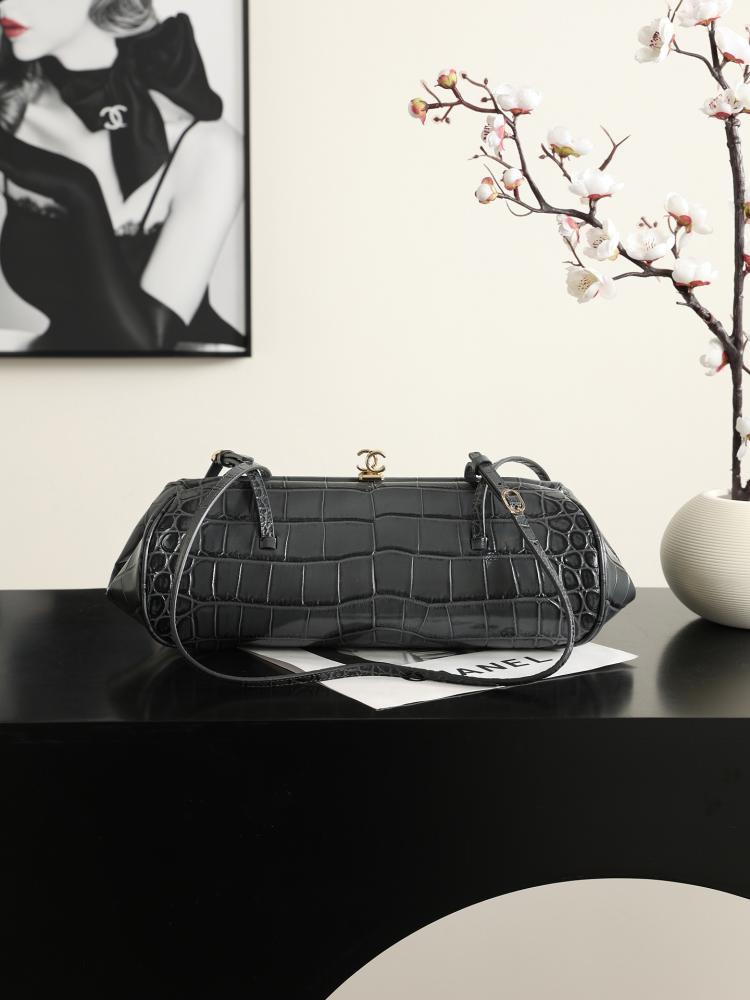 CHANEL Clutch with Leather Strap