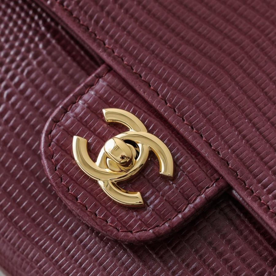 CHANEL Clutch with chain Lizard Embossed Calfskin