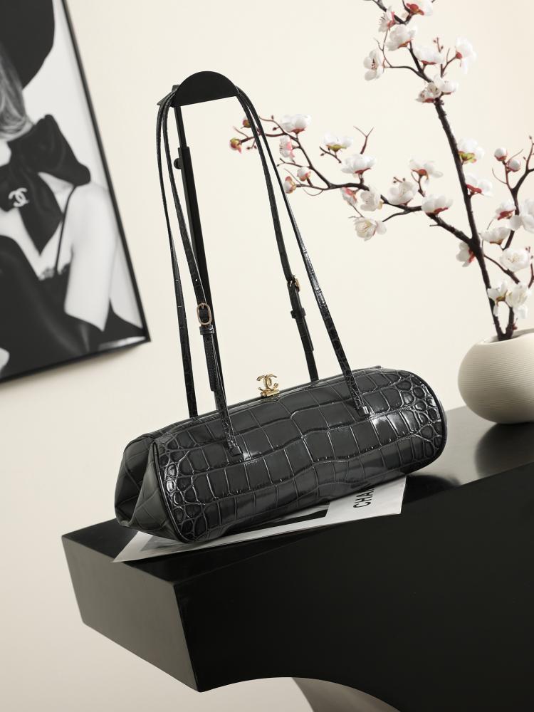 CHANEL Clutch with Leather Strap