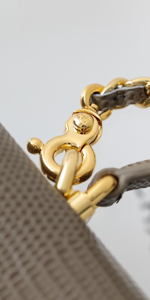 CHANEL Clutch with chain Lizard Embossed Calfskin