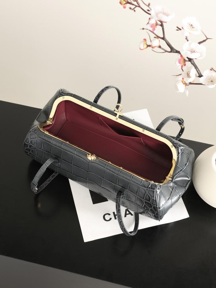 CHANEL Clutch with Leather Strap
