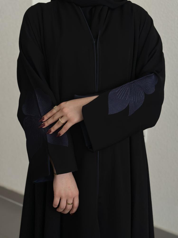 Everyday abaya with padded sleeves and embroidery in navy blue.
