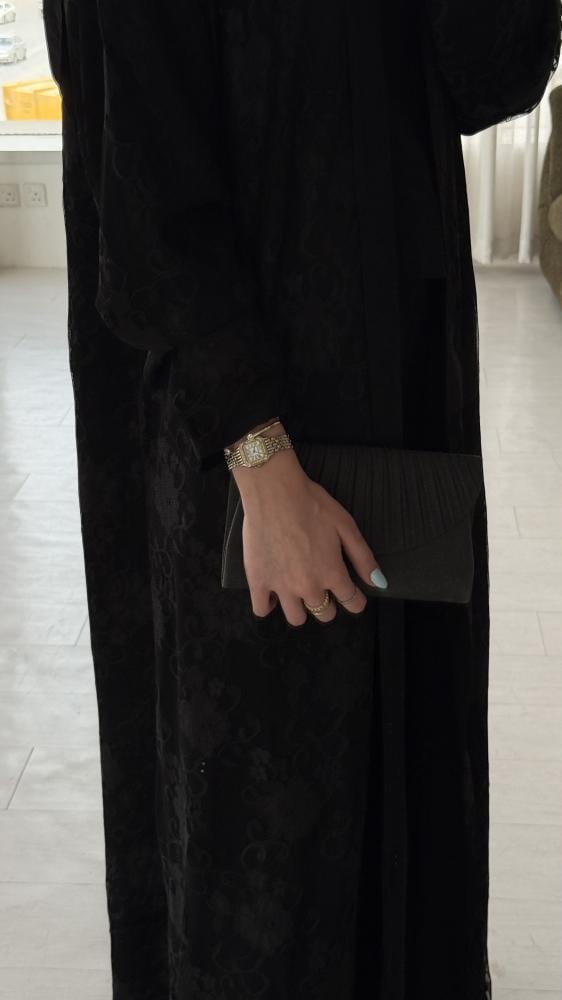 A practical A-line cut abaya with double-face design, lace face, and Blackberry.