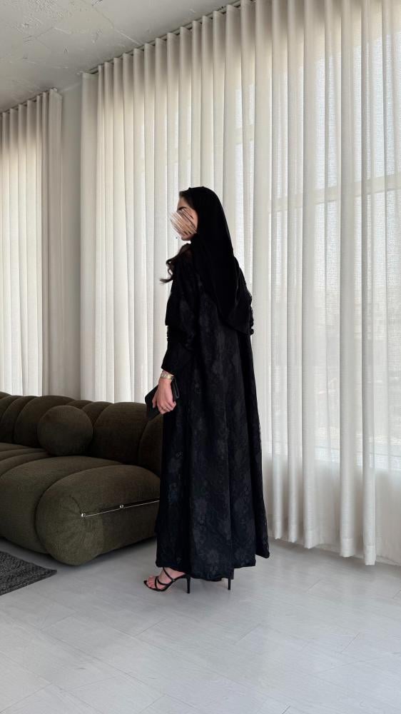A practical A-line cut abaya with double-face design, lace face, and Blackberry.