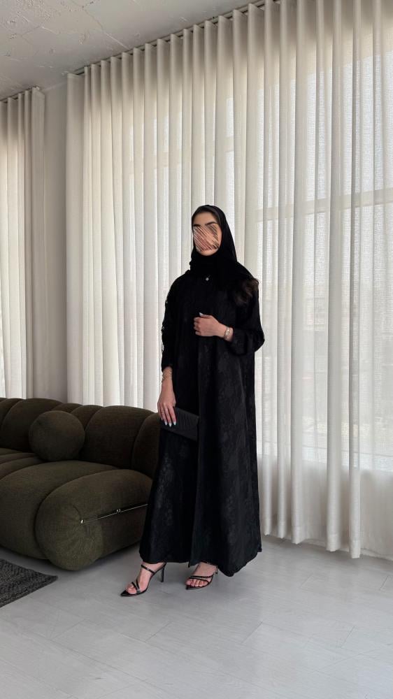 A practical A-line cut abaya with double-face design, lace face, and Blackberry.