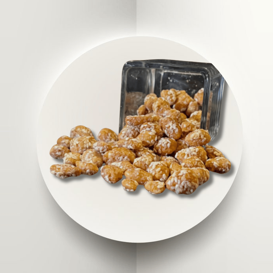 الفول السوداني الممزوج بالعسل والسمسم