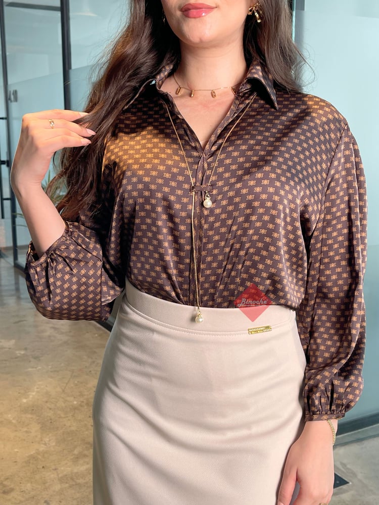 بلوزة نسائية طويلة