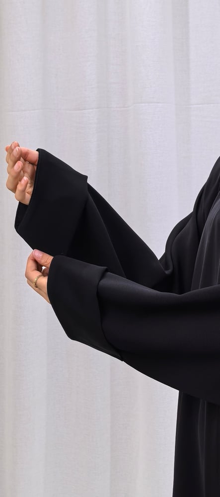 عبايه كلوش زرار كم قلاب