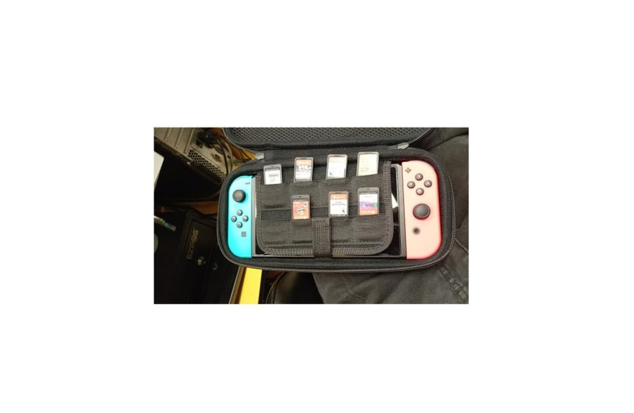 Nintendo Switch مستخدم مع 7 ألعاب وشنطة – ايوس AYOS