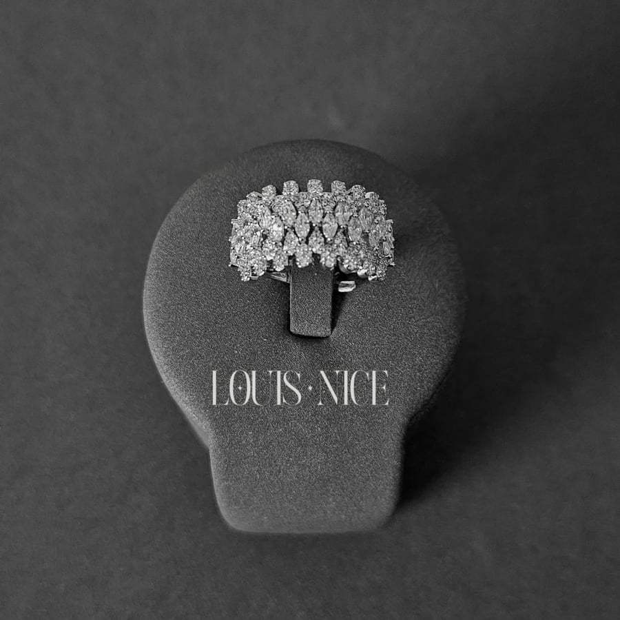 Silver zircon set with diamond precision