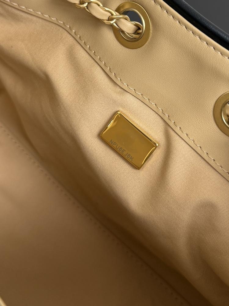 Chanel Quilted Drawstring Tote Bag