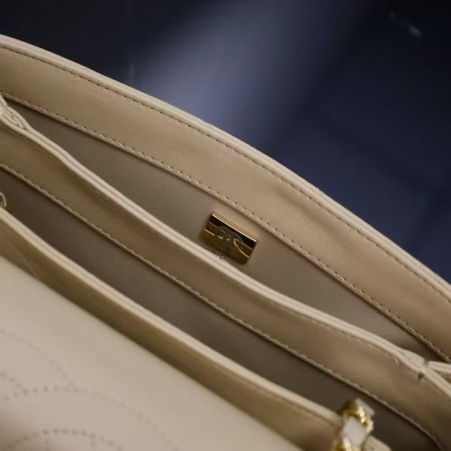 Chanel Quilted Top Handle Flap Bag with Metal Plate