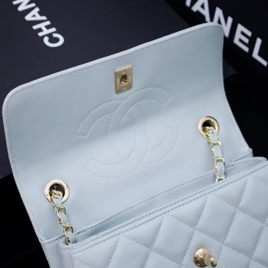Chanel Quilted Top Handle Flap Bag with Metal Plate
