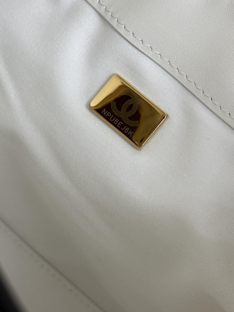Chanel Quilted Drawstring Tote Bag