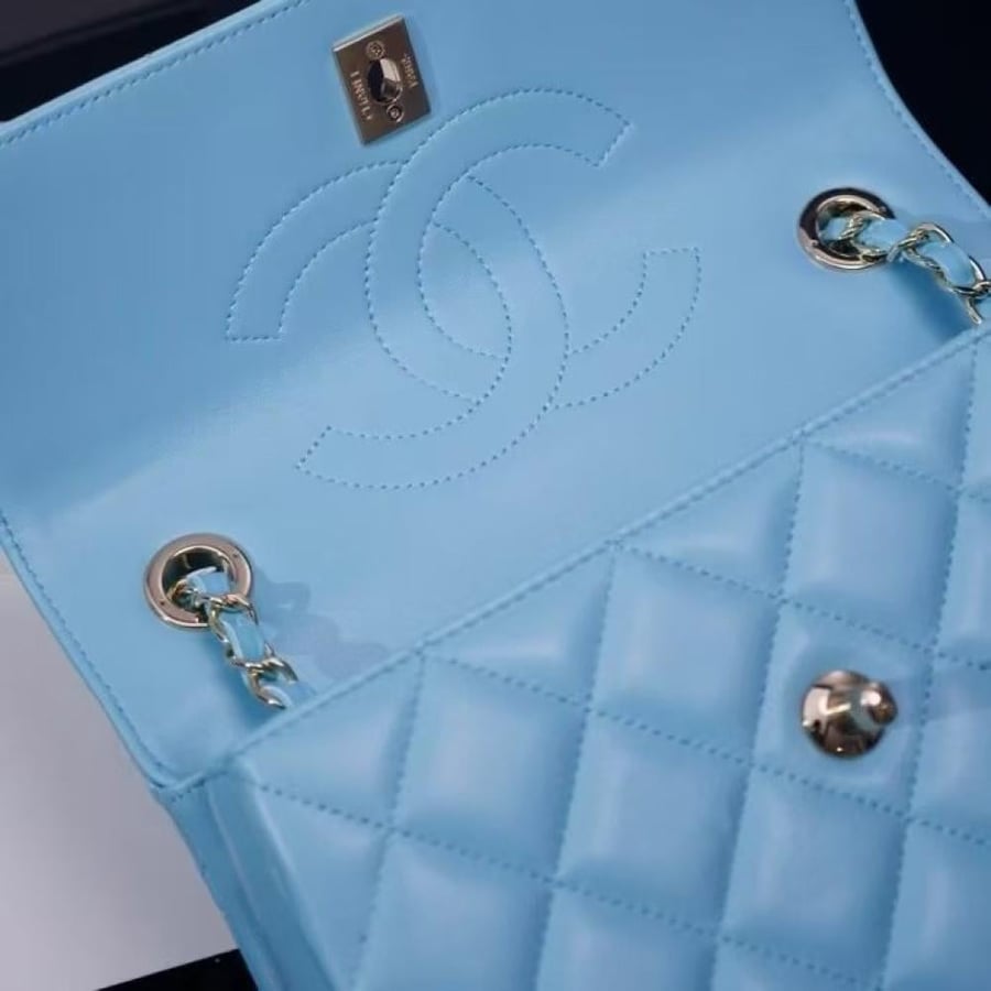 Chanel Quilted Top Handle Flap Bag with Metal Plate