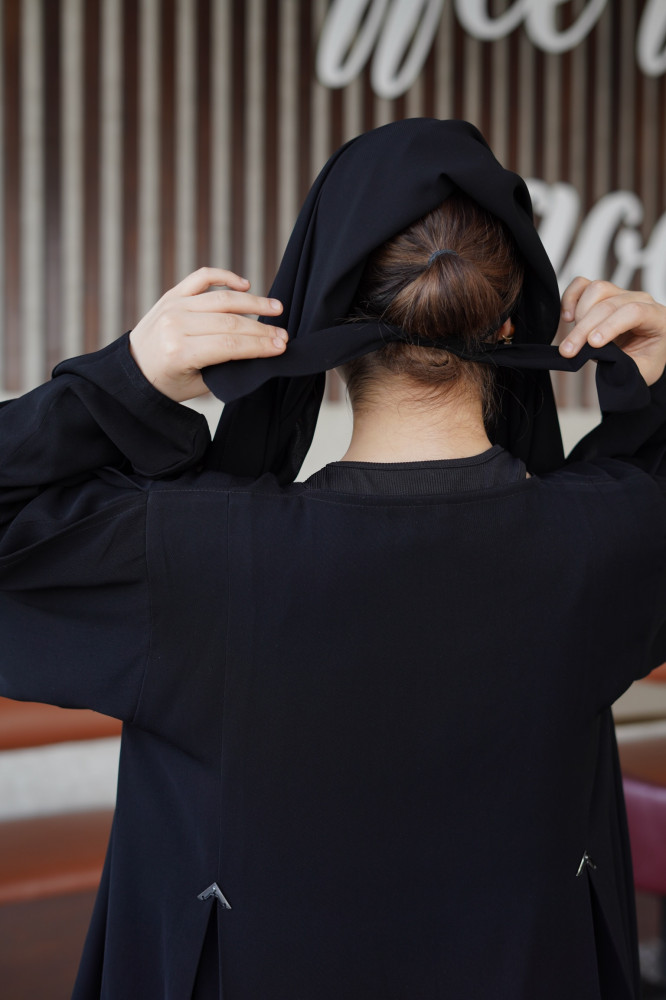A hijab with a fiery design, tied with authentic Korean fabric