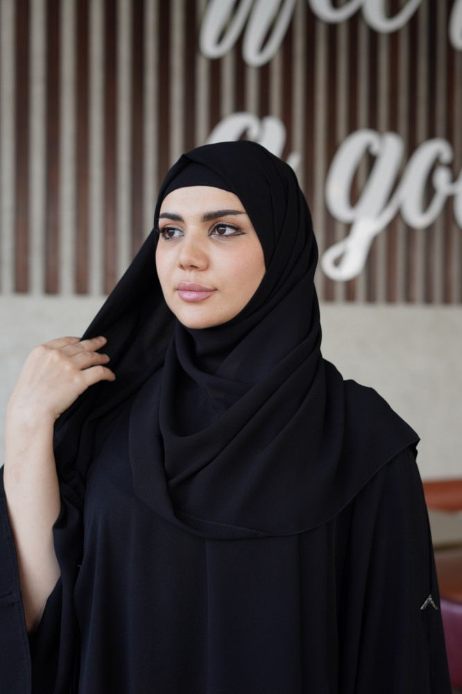 A hijab with a fiery design, tied with authentic Korean fabric