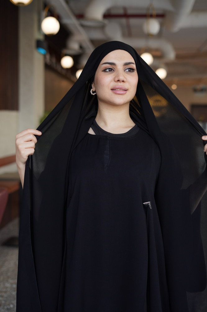 A hijab with a fiery design, tied with authentic Korean fabric