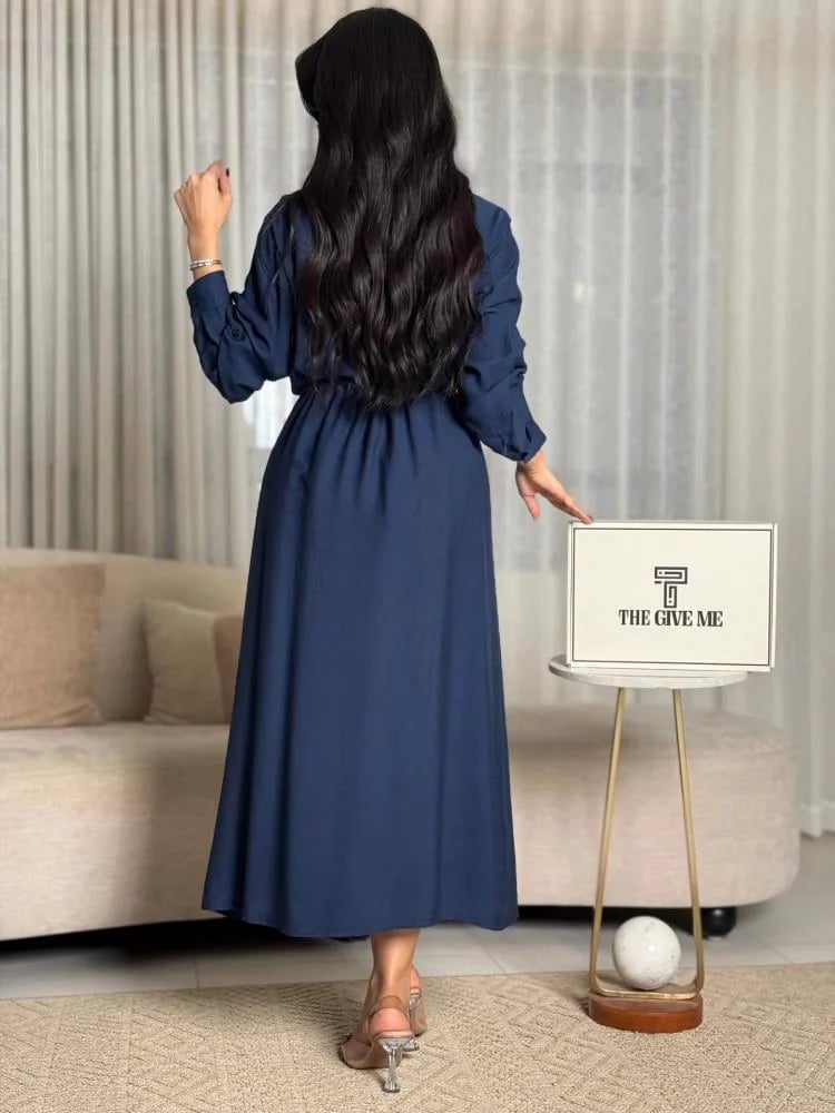 Dress with embroidery on the shoulders and elastic waist